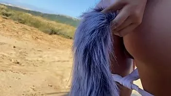 Play Flashing on the beach with fox tail in my ass